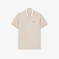 Polo dal taglio classico in jacquard con monogramma